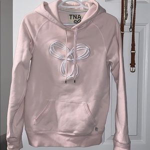 TNA hoodie pink (Aritzia)